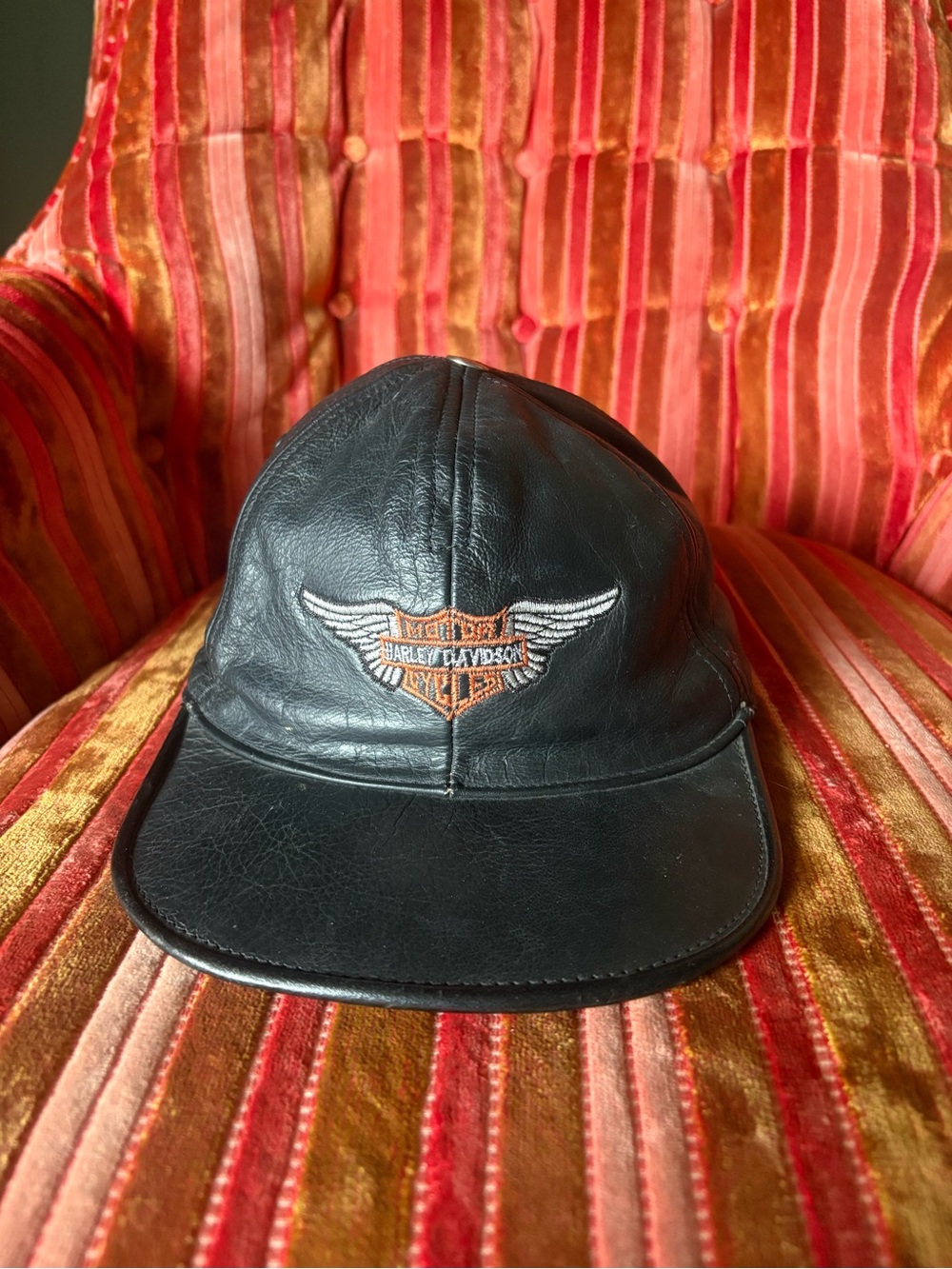 Harley-Davidson Black Leather Cap with Orange & White Winged Emblem